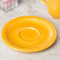Syracuse China 903033201 Cantina 6 1/4" Saffron Carved Porcelain Saucer - 12/Case