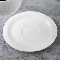 Syracuse China Syracuse 911190031 International 6 1/8" Bone China Round Stacking Tea Saucer - 36/Case