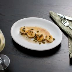 Acopa 9 3/4" X 7 1/2" Bright White Oval Coupe Stoneware Platter - 24/Case