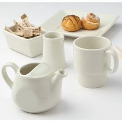 Tuxton BEM-1003 10 Oz. Eggshell Stackable China Mug - 24/Case -Rak Porcelain shop 1608582