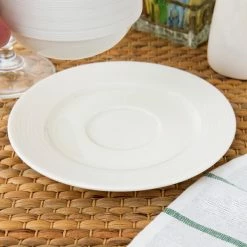 Oneida Manhattan By 1880 Hospitality L5650000500 6 1/4" Warm White Porcelain Coupe Saucer - 48/Case