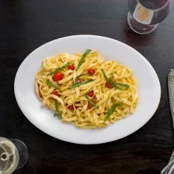 Acopa 13" X 10" Bright White Oval Coupe Stoneware Platter - 4/Pack