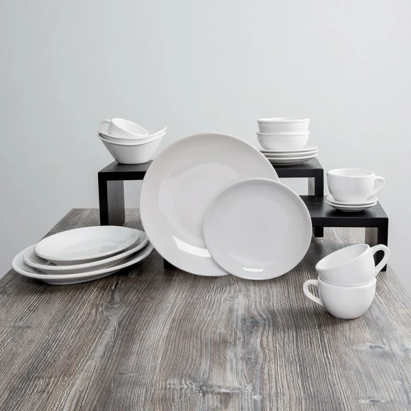 Acopa 13" X 10" Bright White Oval Coupe Stoneware Platter - 4/Pack 3 Acopa 13" X 10" Bright White Oval Coupe Stoneware Platter - 4/Pack - Image 3