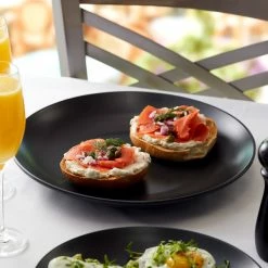 Acopa 11" Matte Black Stoneware Coupe Plate - 12/Case