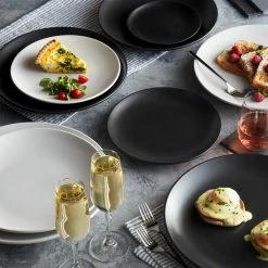 Acopa 9" Matte Black Stoneware Coupe Plate - 24/Case -Rak Porcelain shop 1859869