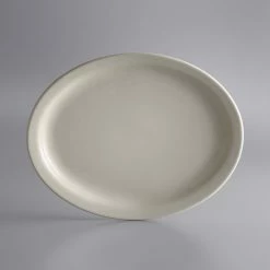 World Tableware NR-14 Kingsmen White 13" X 10 1/4" Ultima Cream White Narrow Rim Oval Stoneware Platter - 12/Case