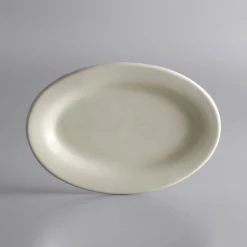 World Tableware PWC-34 Princess White 9 3/8" X 6 1/2" Ultima Cream White Oval Rolled Edge Stoneware Platter - 24/Case