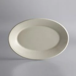 World Tableware PWC-60 Princess White 13 1/2" X 9 3/4" Ultima Cream White Oval Rolled Edge Stoneware Platter - 12/Case