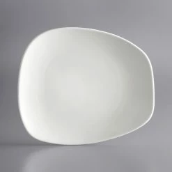 Acopa Nova 10 1/2" X 9 1/4" Cream White Asymmetric Stoneware Plate - 12/Case -Rak Porcelain shop 1893816
