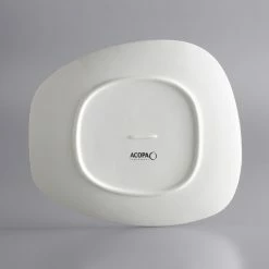 Acopa Nova 10 1/2" X 9 1/4" Cream White Asymmetric Stoneware Plate - 12/Case -Rak Porcelain shop 1893817