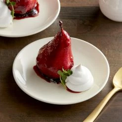 Acopa 6 1/2" Round Ivory (American White) Coupe Stoneware Plate - 36/Case