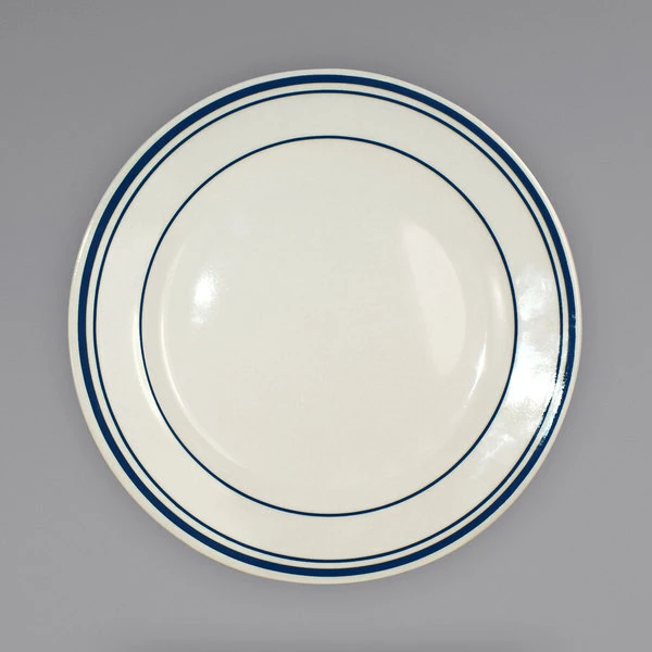 International Tableware CT-6 Catania 6 5/8" Ivory (American White) Stoneware Plate With Blue Bands - 36/Case 1 International Tableware CT-6 Catania 6 5/8" Ivory (American White) Stoneware Plate With Blue Bands - 36/Case