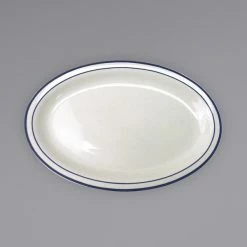 International Tableware DA-51 Danube 15 1/2" X 11 3/4" Ivory (American White) Blue Speckled Narrow Rim Stoneware Platter With Blue Bands - 6/Case