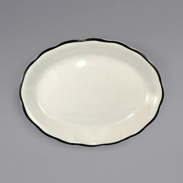 International Tableware SY-14 Sydney 12 3/4" X 9 1/4" Ivory (American White) Scalloped Edge Stoneware Platter With Black Rim - 12/Case 1 International Tableware SY-14 Sydney 12 3/4" X 9 1/4" Ivory (American White) Scalloped Edge Stoneware Platter With Black Rim - 12/Case
