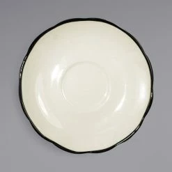 International Tableware SY-36 Sydney 4 7/8" Ivory (American White) Scalloped Edge Stoneware Saucer With Black Rim - 36/Case