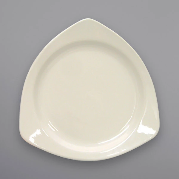 International Tableware TR-10-AW Valencia 10 1/2" Triangular Ivory (American White) Stoneware Plate - 12/Case 1 International Tableware TR-10-AW Valencia 10 1/2" Triangular Ivory (American White) Stoneware Plate - 12/Case