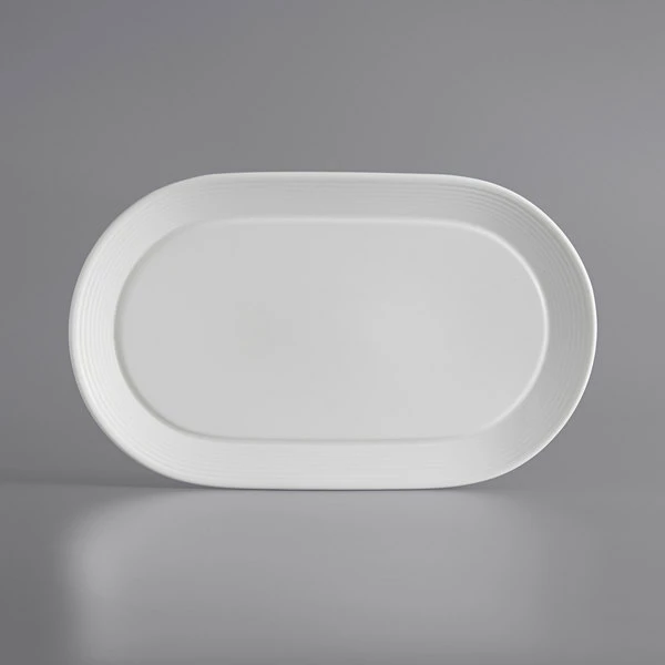 Acopa Liana 12" X 7 1/4" Bright White Embossed Lines Wide Rim Porcelain Platter - 12/Case 2 Acopa Liana 12" X 7 1/4" Bright White Embossed Lines Wide Rim Porcelain Platter - 12/Case - Image 2