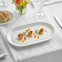 Acopa Liana 12" X 7 1/4" Bright White Embossed Lines Wide Rim Porcelain Platter - 12/Case