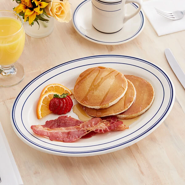 Acopa 12 5/8" X 8 3/4" Ivory (American White) Wide Rim Stoneware Platter With Blue Bands - 12/Case 1 Acopa 12 5/8" X 8 3/4" Ivory (American White) Wide Rim Stoneware Platter With Blue Bands - 12/Case