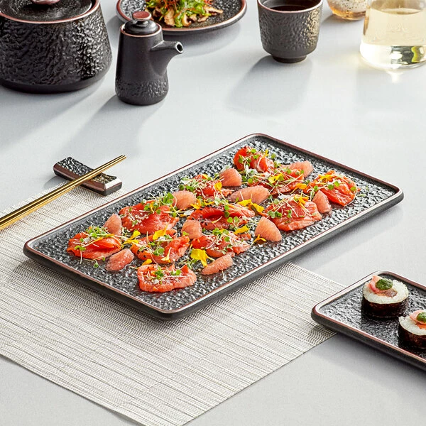 Acopa Heika 13 3/4" X 8" Black Matte Textured Rectangular Flat Stoneware Plate - 12/Case 1 Acopa Heika 13 3/4" X 8" Black Matte Textured Rectangular Flat Stoneware Plate - 12/Case