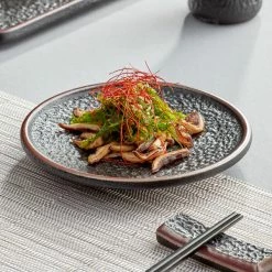 Acopa Heika 6" Black Matte Textured Coupe Stoneware Plate - 12/Case