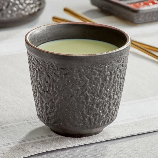 Acopa Heika 12 Oz. Black Matte Textured Stoneware Mug - 12/Case 1 Acopa Heika 12 Oz. Black Matte Textured Stoneware Mug - 12/Case