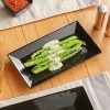 Acopa 10" X 5 1/2" Glossy Black Rectangular Stoneware Platter - 4/Pack
