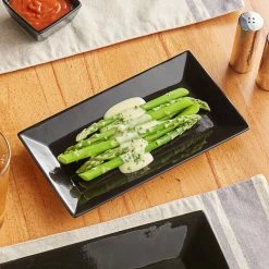 Acopa 10" X 5 1/2" Glossy Black Rectangular Stoneware Platter - 4/Pack