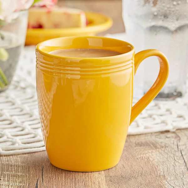 Acopa Capri 12 Oz. Mango Orange Stoneware Mug - 12/Pack 1 Acopa Capri 12 Oz. Mango Orange Stoneware Mug - 12/Pack