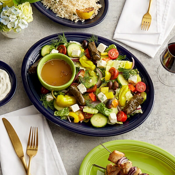 Sample - Acopa Capri 13 3/4" X 10 1/2" Deep Sea Cobalt Oval Stoneware Coupe Platter 4 Sample - Acopa Capri 13 3/4" X 10 1/2" Deep Sea Cobalt Oval Stoneware Coupe Platter - Image 4