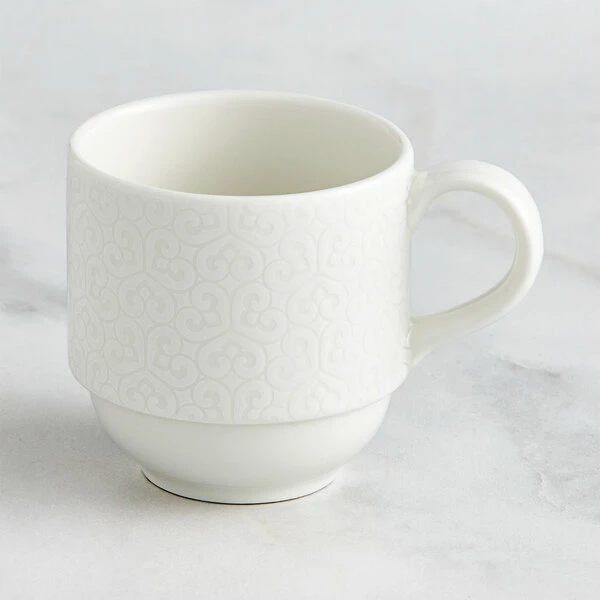 RAK Porcelain Choice 6.8 Oz. Ivory Embossed Porcelain Stackable Coffee Cup - 12/Case 1 RAK Porcelain Choice 6.8 Oz. Ivory Embossed Porcelain Stackable Coffee Cup - 12/Case