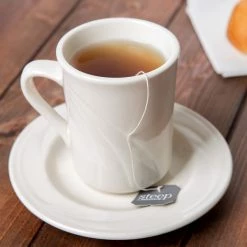 Syracuse China 950038431 Cascade 5 3/4" Ivory (American White) Round Medium Rim Flint Porcelain Tea Saucer - 36/Case -Rak Porcelain shop 983803