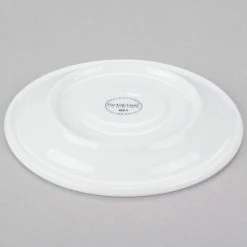 Syracuse China 911194021 Reflections 5 5/8" Aluma White Porcelain Tea / Cappuccino Saucer - 36/Case -Rak Porcelain shop 984072